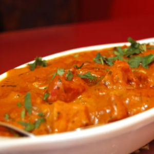 Butter Chicken Halal Boneless Chicken Thigh Meat Marinated in Yogurt, sour cream Spice and then Slow cooked the meat in buttery onion tomato curry, on the sweeter creamy side.