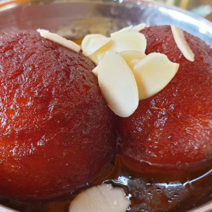 Gulab Jamun (2 Pcs) Condensed Milk dumpling in Sweet Syrup 2 pcs with optional Walnuts 