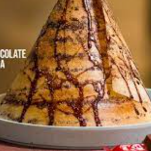 Chocolate dosa is a sweet variation of the traditional South Indian dosa, a crepe-like pancake.